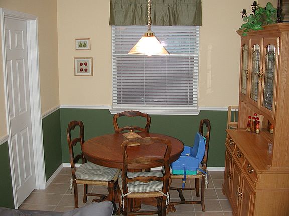 The breakfast room is open to the kitchen and family room.