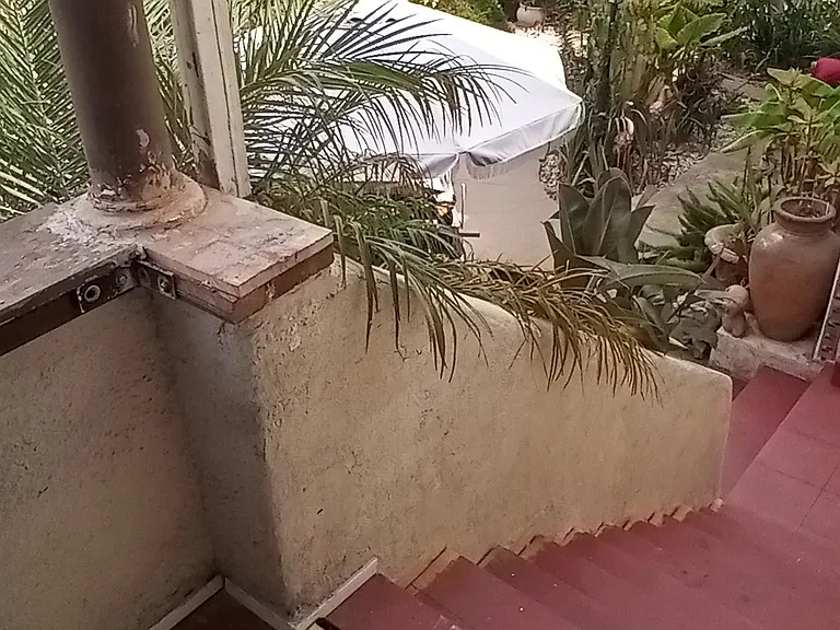Top of staircase.