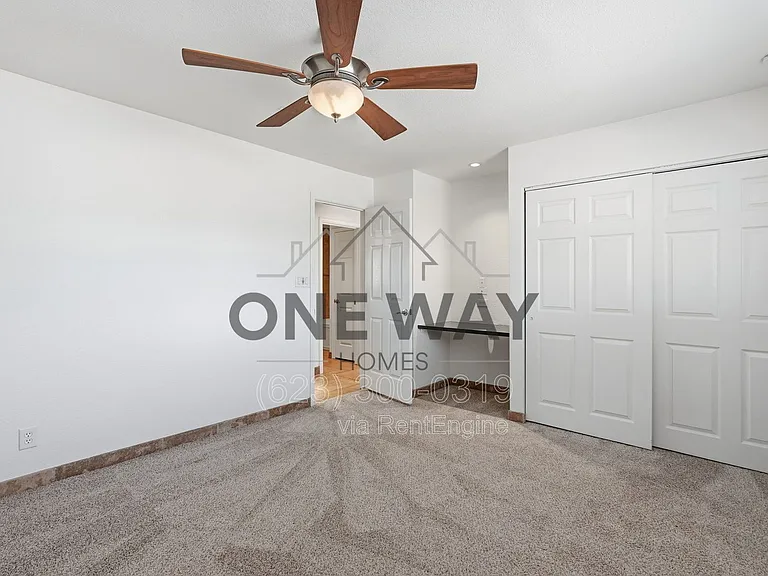 8702 E Sheridan St — Photo 14