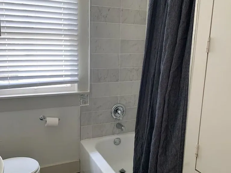 E 11th 1/2 St — Photo 14
