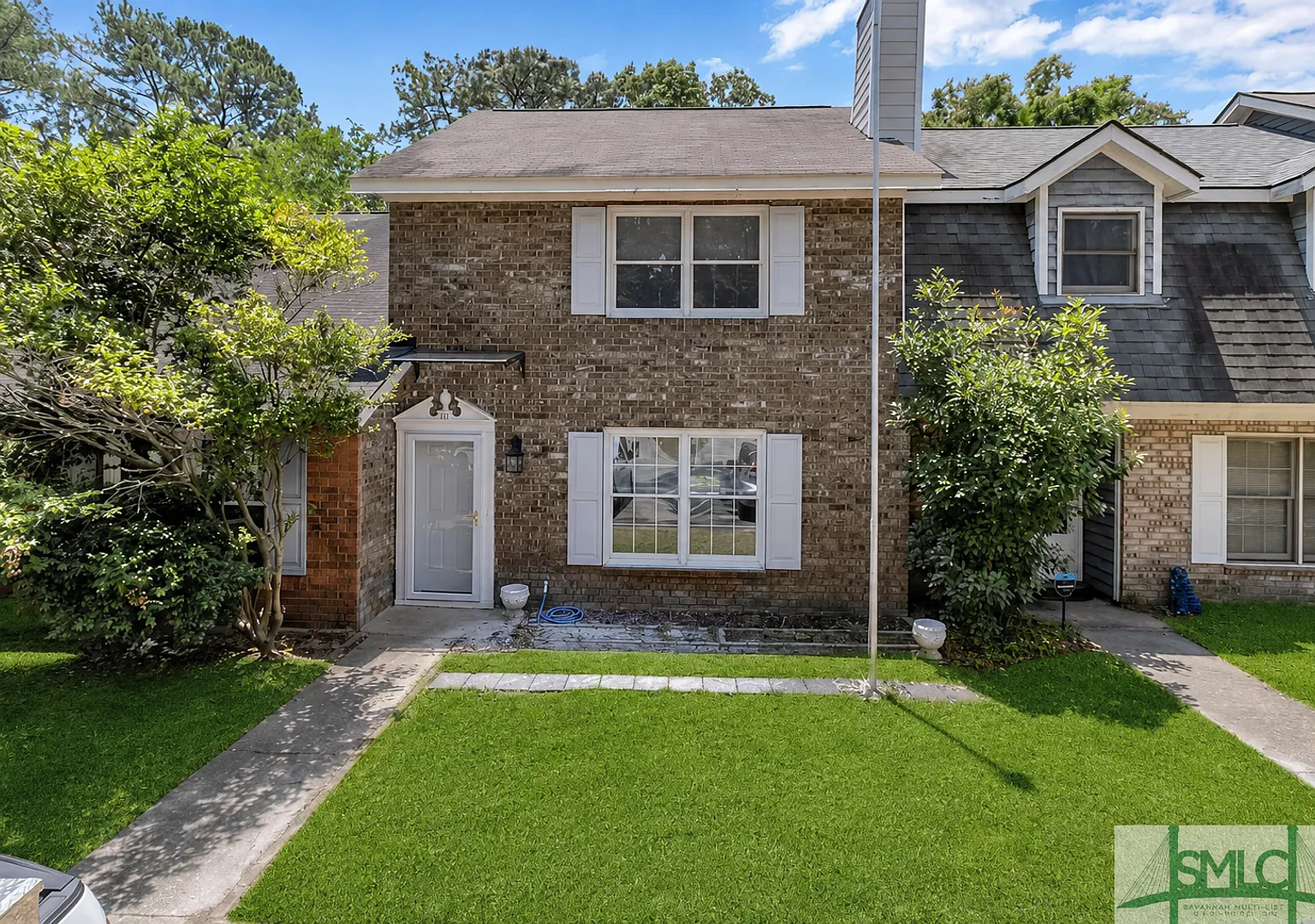 Spacious 2-Bedroom Brick Townhome with Private Fenced Yard — Photo 1