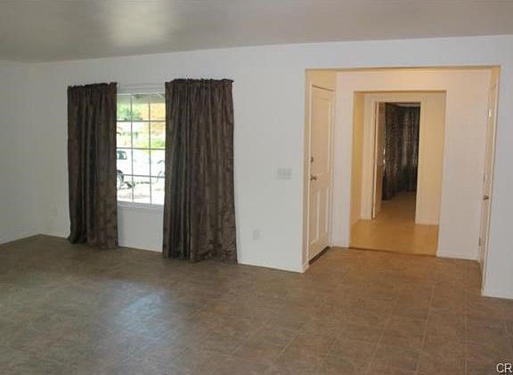 Spacious living room area at entrance