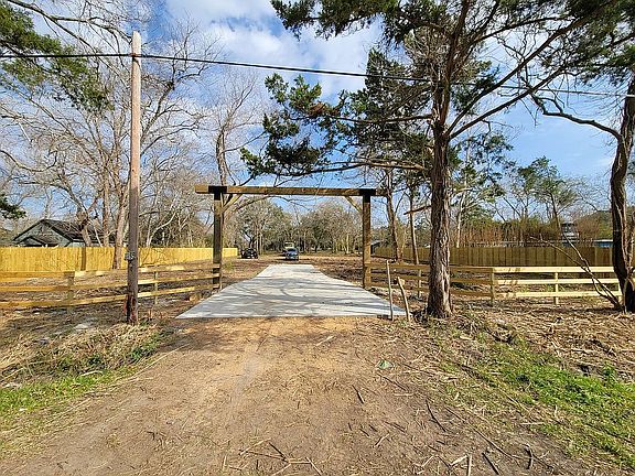 Brand new fence and driveway