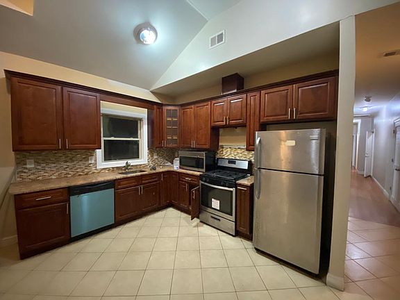 kitchen , stainless steal appliances and dishwasher