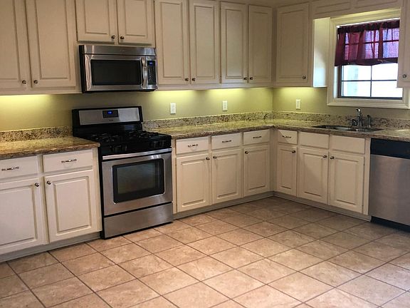 Very spacious kitchen. Lots of cabinets. Gas stove