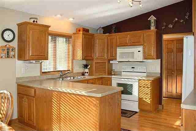 Vaulted Kitchen with wood floors