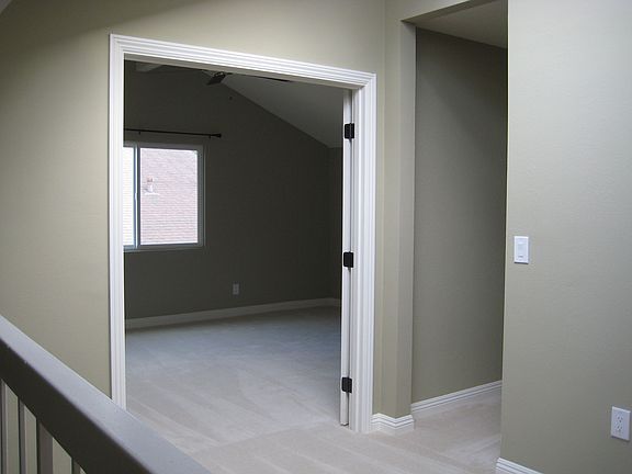 Upstairs loft with bedroom and hallway to bathroom & attic