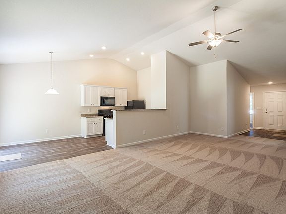 High, vaulted ceiling spans the whole space