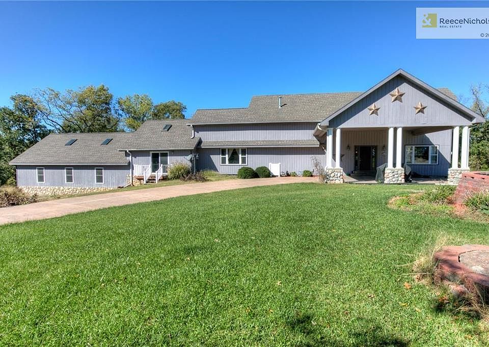 Reverse 1.5 story home, pool and acreage