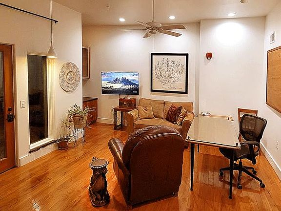 Setup for an office, the desk/table may be arranged for dining. Open spaces allow for wheelchair. Wifi & Netflix included.