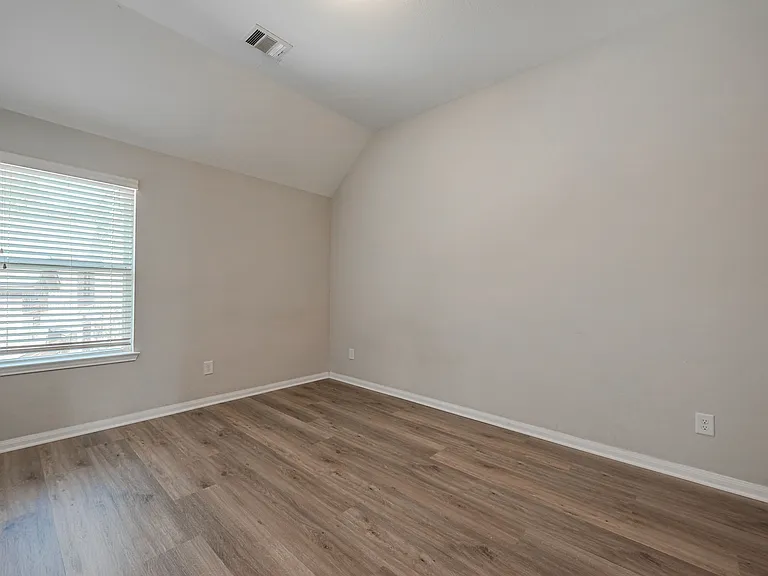One of the other 4 LARGE upstairs bedrooms