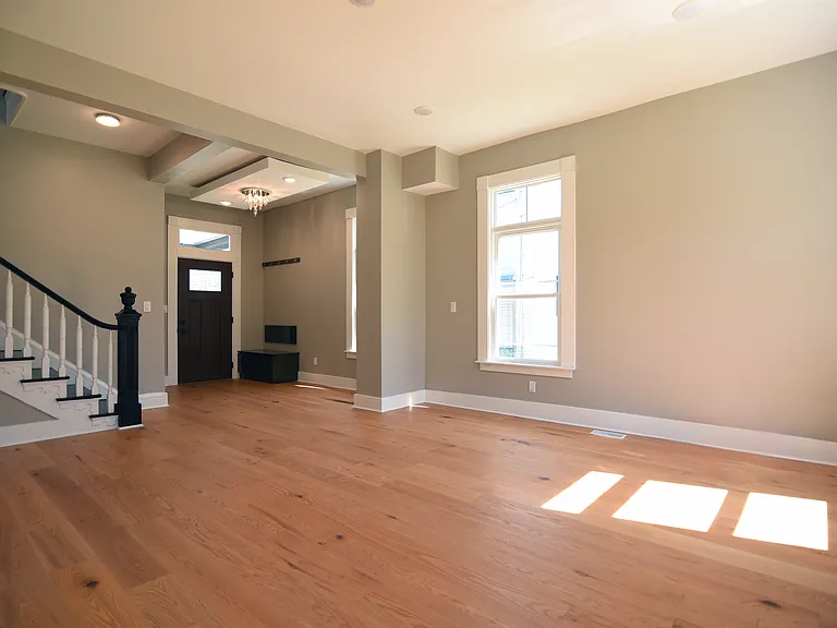 Foyer great room area. Extra large windows throughout all wood floors on this level.