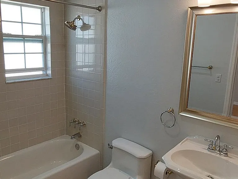 Primary bathroom with shower and soaking tub.