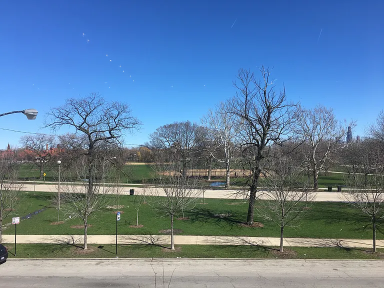 Directly across from a huge park connecting to 606 bike trail