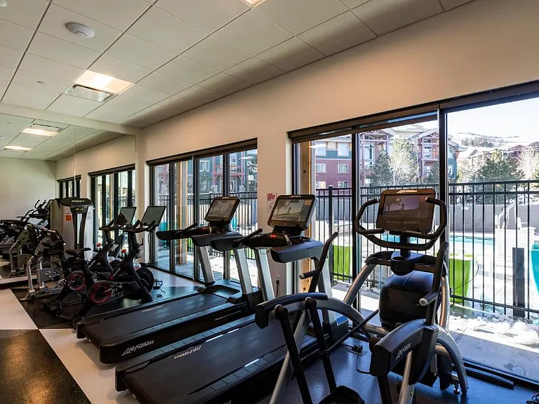 __ Gym
__ Stay active in the fully equipped gym, featuring modern fitness equipment for a great workout. Whether you're starting your day or unwinding after outdoor adventures, it's the perfect space to stay in shape during your stay.