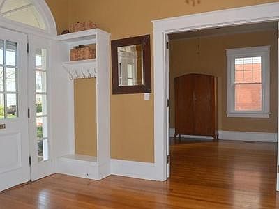 Front entryway, coat hanger, entrance to bonus room. (Prior paint paint job).