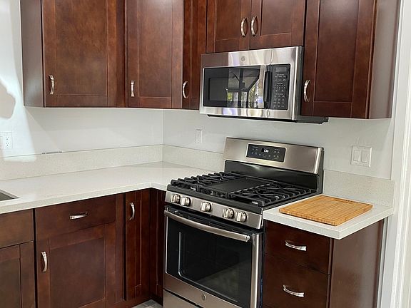 New kitchen with new stainless steel appliances
