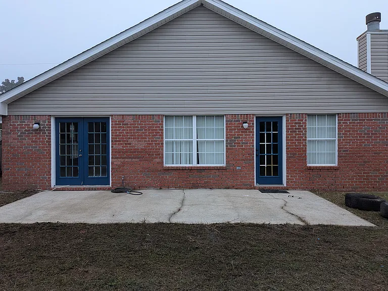 Rear of house. Extra large patio. House is wired for hot tub installation.