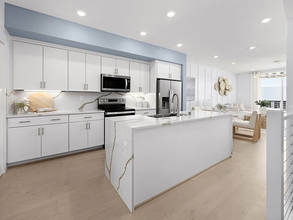 Gorgeous kitchen with waterfall edge island