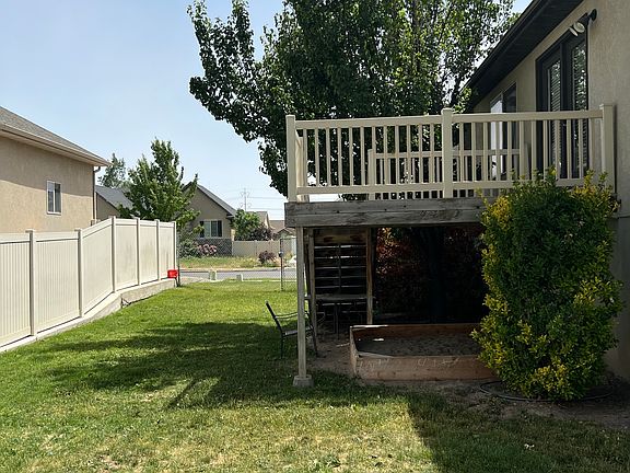 back deck off the kitchen area. sandbox under deck