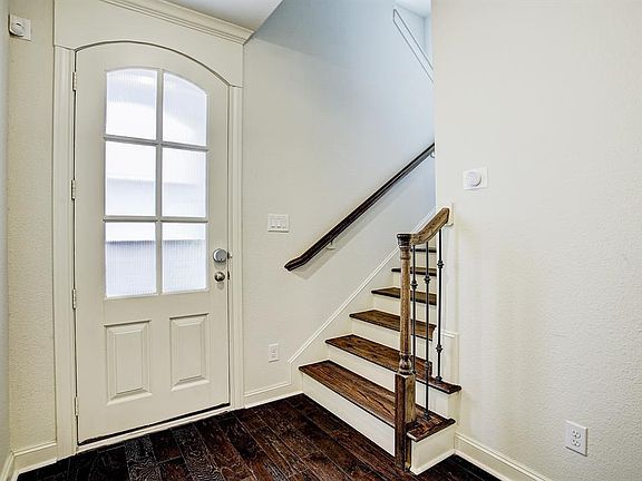 Entry with new engineered wood floors!