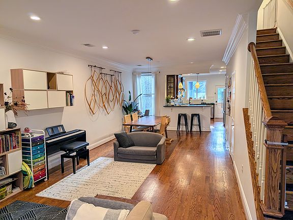First floor open floor plan. Features half bath and laundry closet under the stairs.