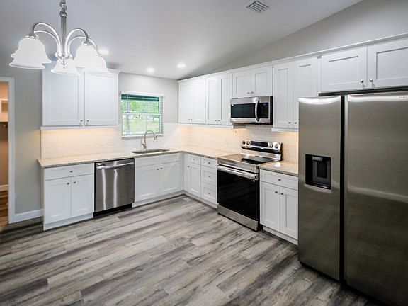 3rd image of 9184 N Peachtree Way