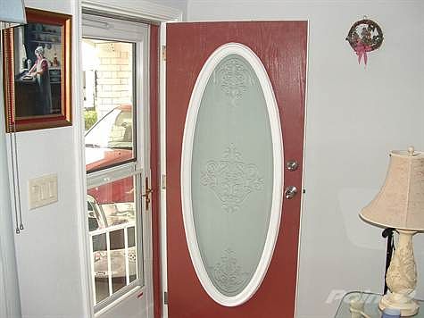 UPDATED FRONT DOOR AND STORM DOOR