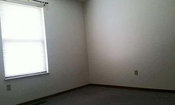Good sized bedrooms also with fresh white paint and some window treatments.