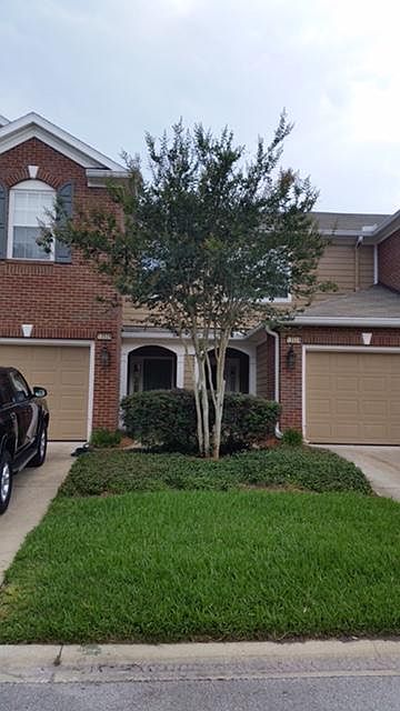 Left side of photo is garage and entrance to unit.