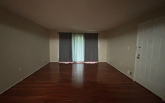 Living room with patio screen closed