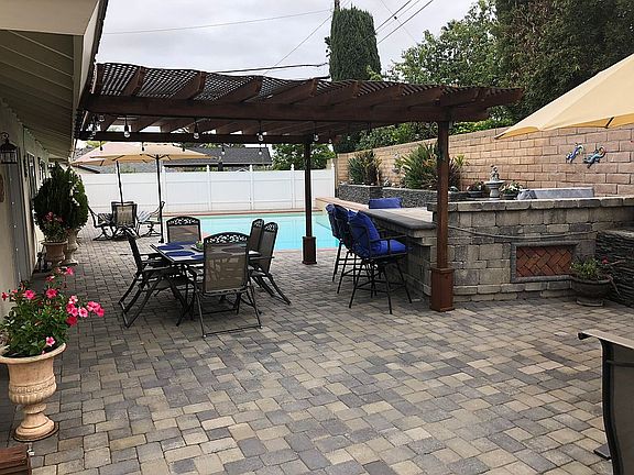 Pergola and barbecue island