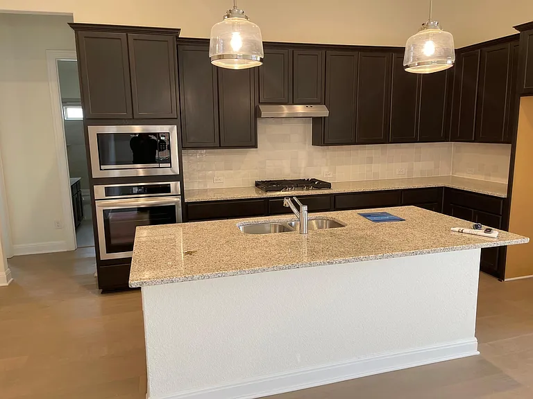 kitchen (gas stove, oven, microwave, fridge)