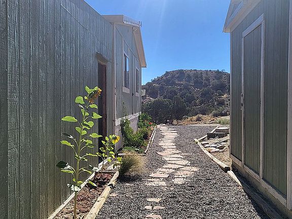 Gravel pathway shed & garage
