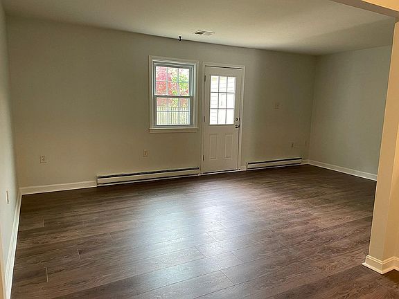 Living room with door towards the backyard