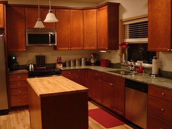 Kitchen with center island w/butcher block
