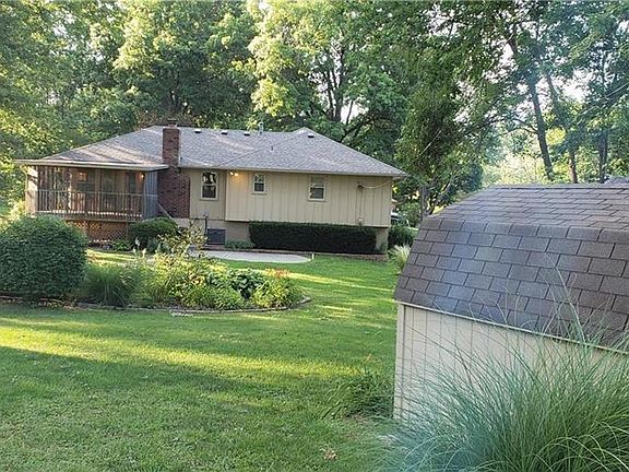 Beautiful landscaped backyard. Covered deck off family room.