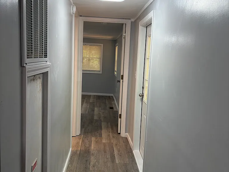 Hallway to bedroom and bathroom.
