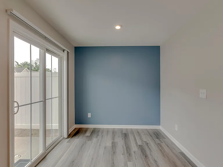 Dining room as you walk into the house from the backdoor. Kitchen is adjacent.