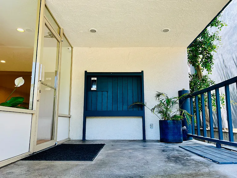 Front door entry of the condo building