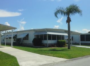 1003 Thrush Cir, Barefoot Bay, FL 32976