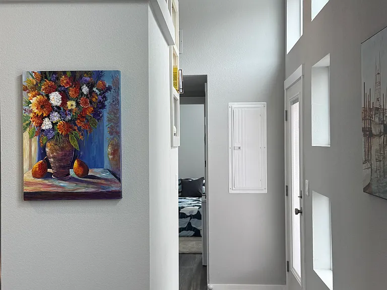 hall way with exterior door to patio