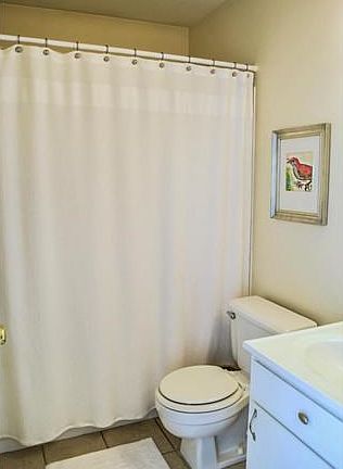 Master bath with tile floor.