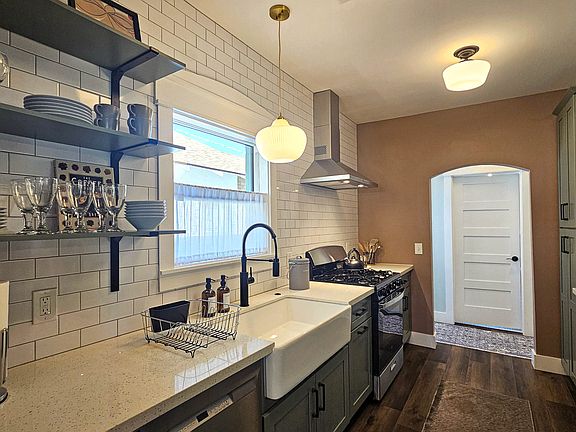 You''ll find soft-close cabinets, quartz countertops, a spacious pantry, pull-out garbage and recycling bins. For an eco-friendly touch, you can compost through "Recycled City," turning your scraps into nutrient-rich soil during your stay.