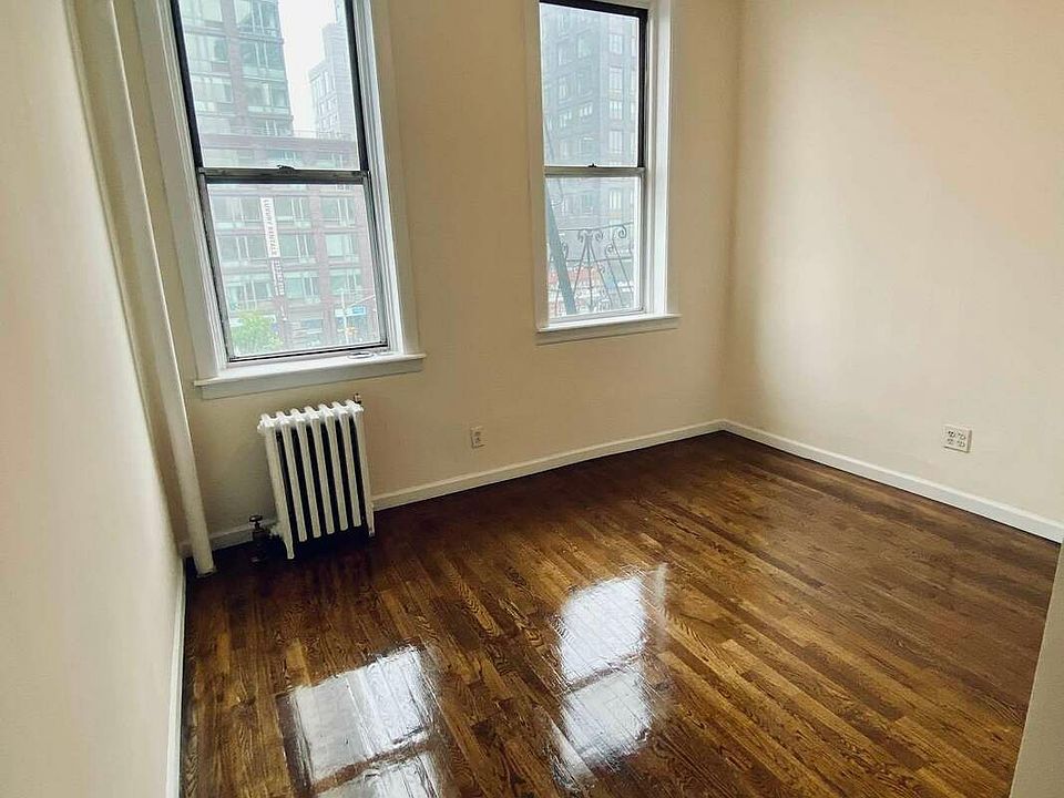 1st image of 114 E 1st St APT 14