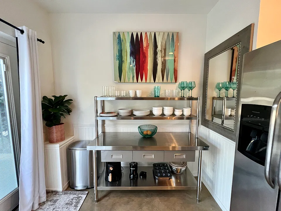 The kitchen is equipped with a Lavazza beverage maker, bullet blender, rice cooker, toaster, and more!