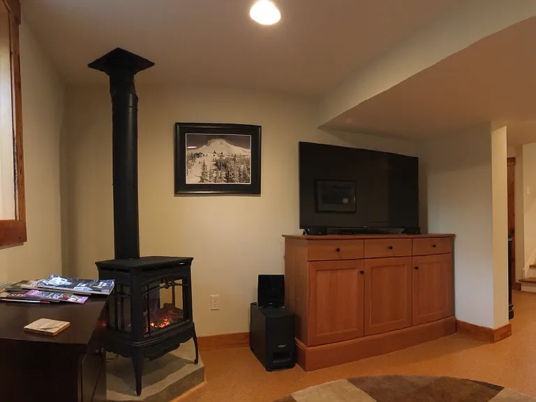 basement gas fireplace and entertainment system