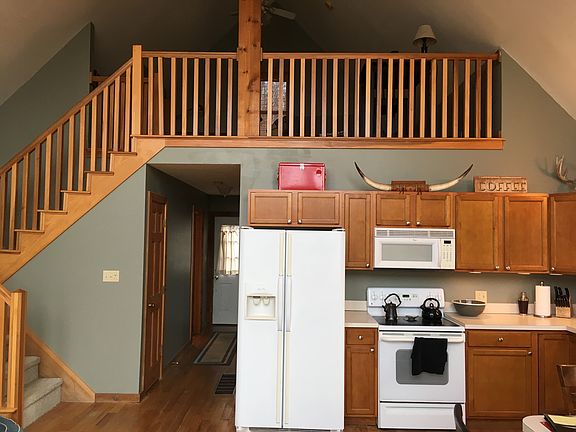 Kitchen with lofted bedroom