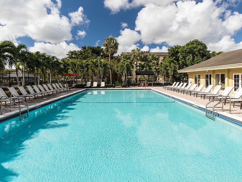 Soak up some sun at one of the palmside lounge chairs.