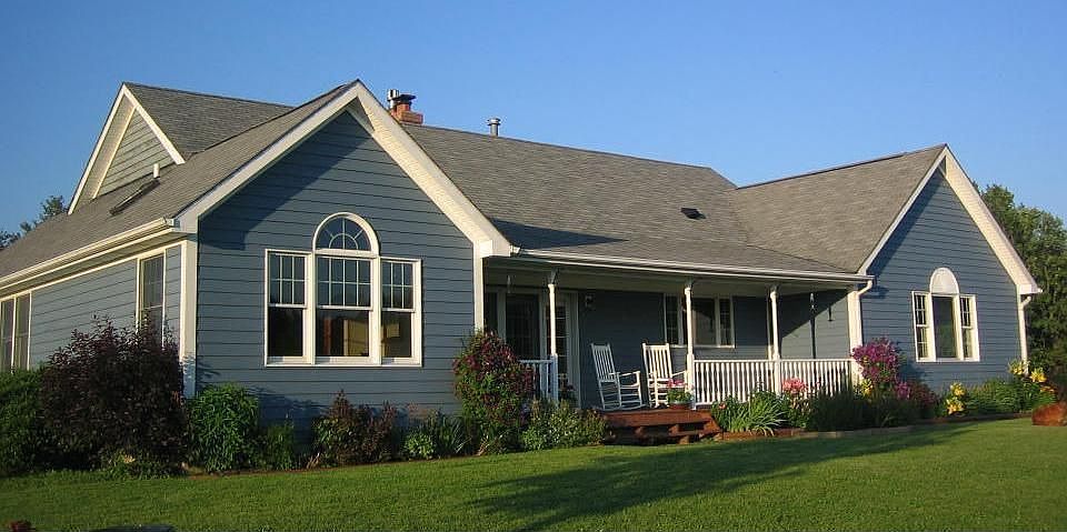 Front with Gardens and Porch